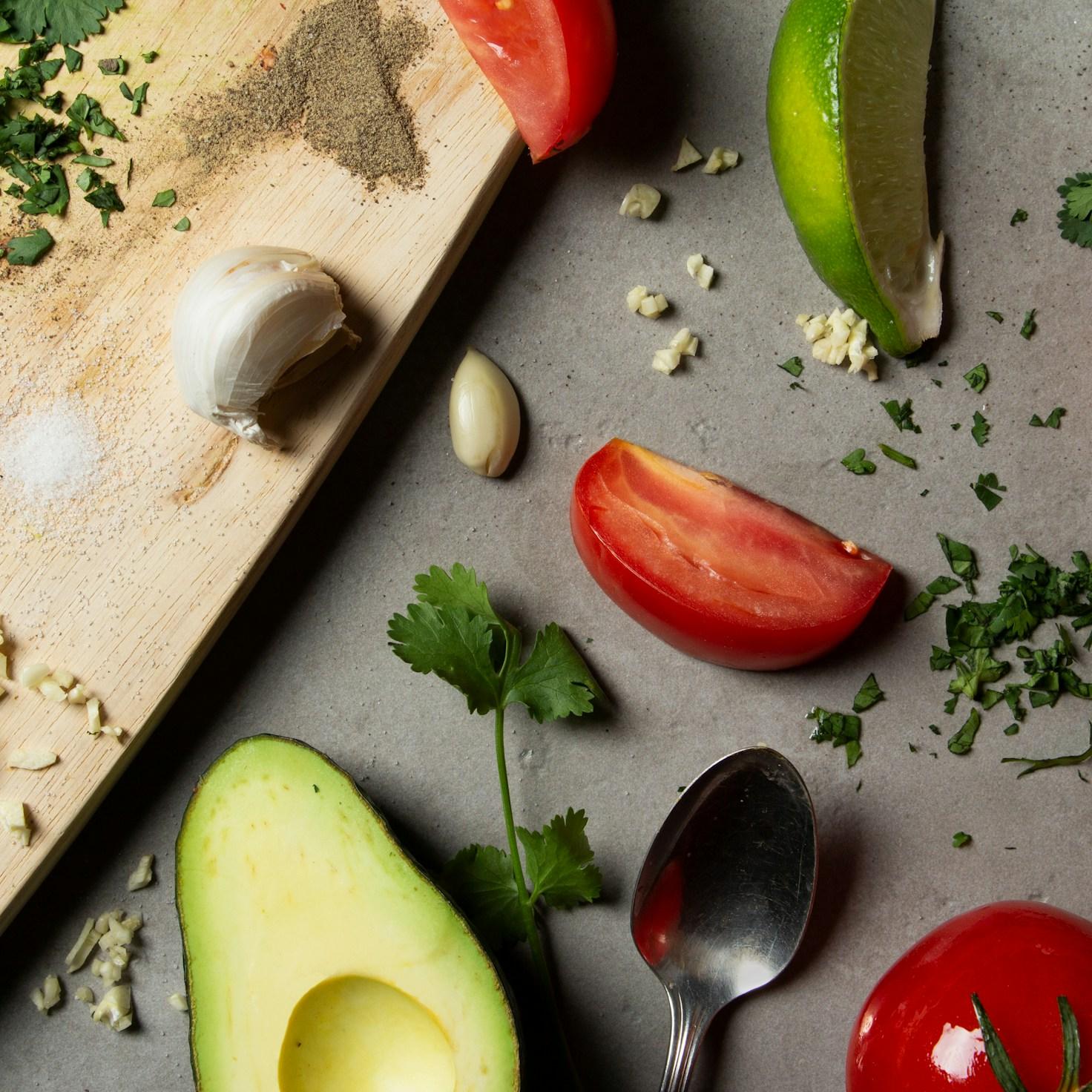 Diverse group of community members sharing a meal together, showcasing the social bonds formed through collaborative cooking